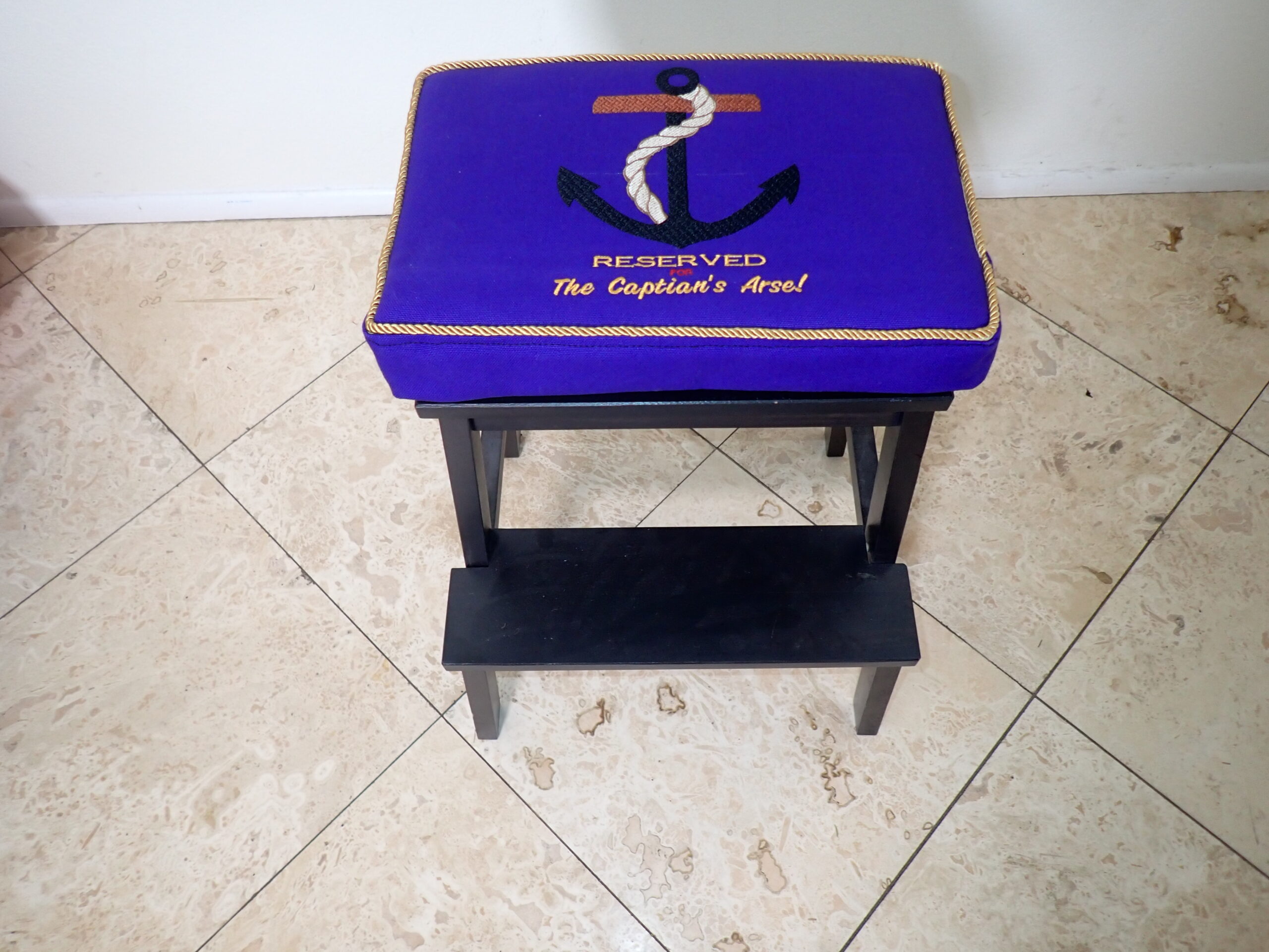 Upholstery step stool with folding top and embroidery